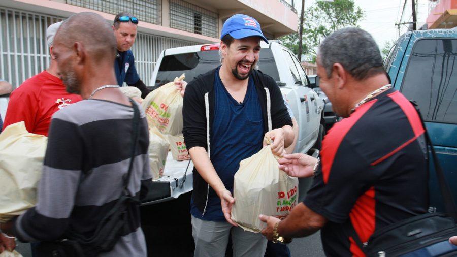 VEGA ALTA, PUERTO RICO - NOVEMBER 07:  Lin-Manuel Miranda delivers food to victims of Hurricane Maria at La Placita de Guisin on November 7, 2017 in Vega Alta, Puerto Rico.  (Photo by Gladys Vega/Getty Images)